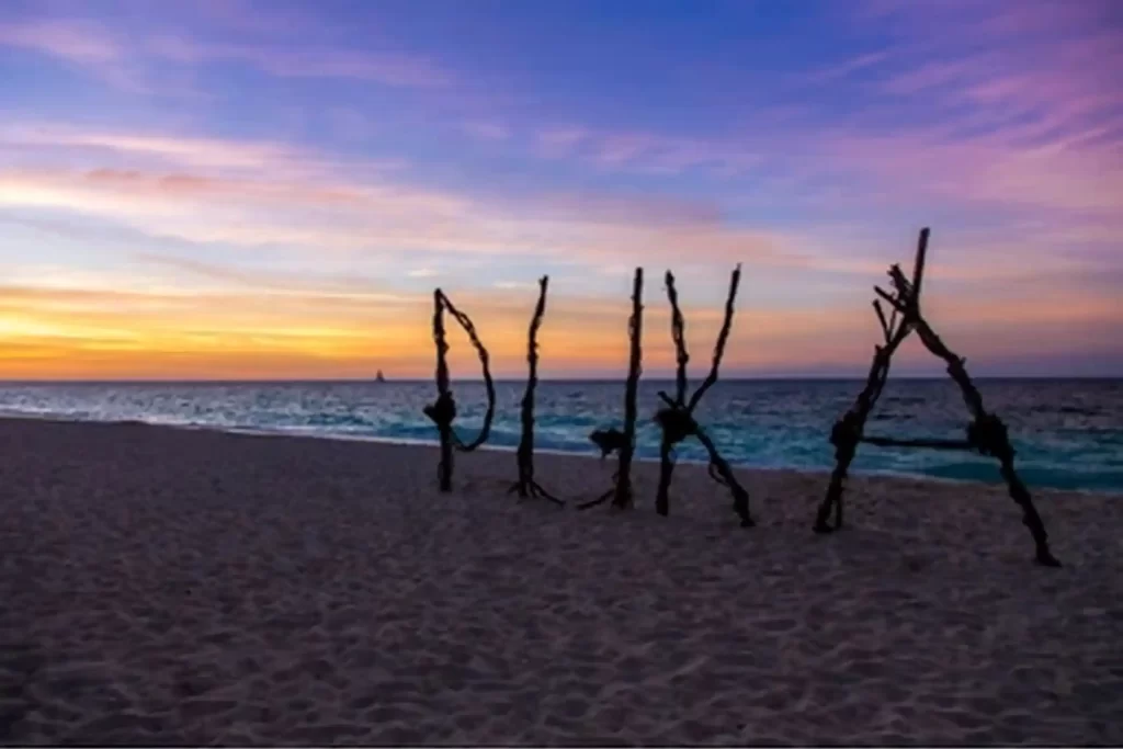 The Signage of Puka Beach during sunset