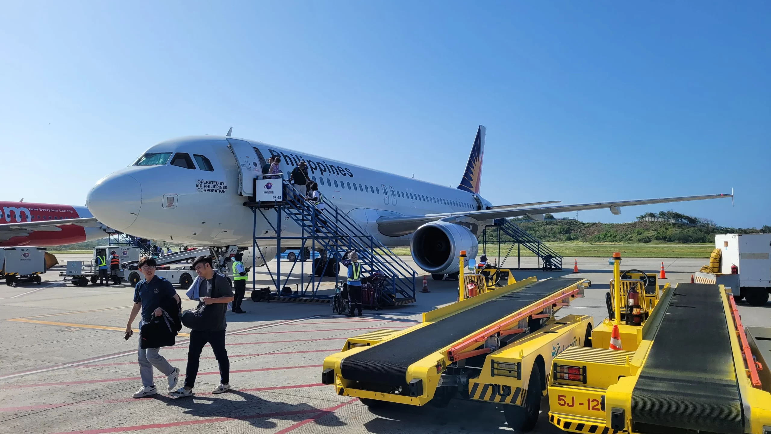 Tourists exiting the airplane in Caticlan Airport