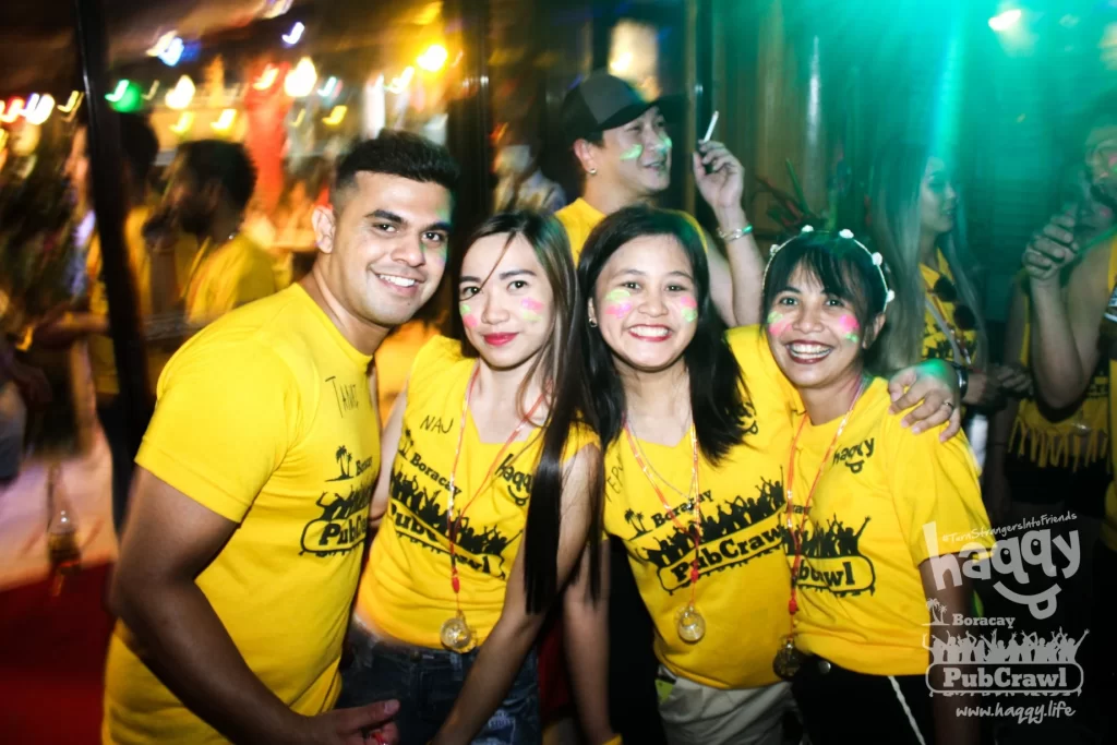 Tourists enjoying bar hopping with Boracay Pub Crawl Staff