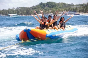 group of friends enjoying a banana boat ride