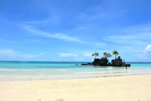 Boracay White Beach coastline with tourists enjoying the beach and water activities