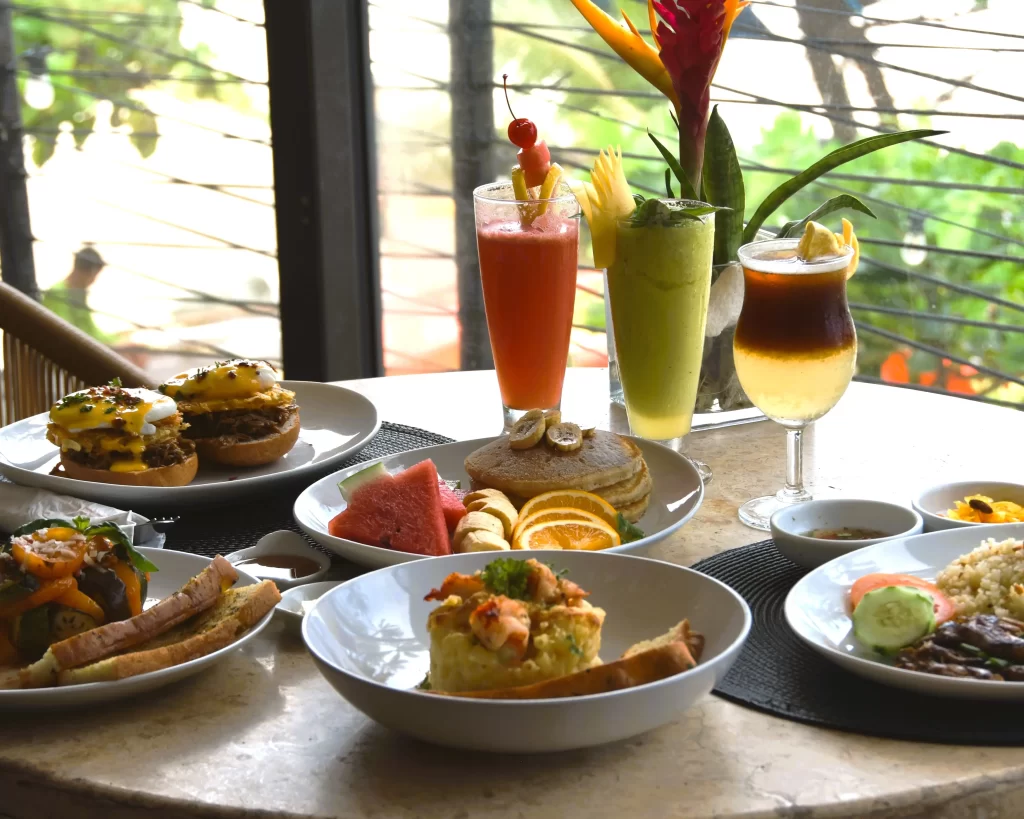 Assorted breakfast dishes and fresh tropical drinks served at The Monkey Tree restaurant in Boracay Island