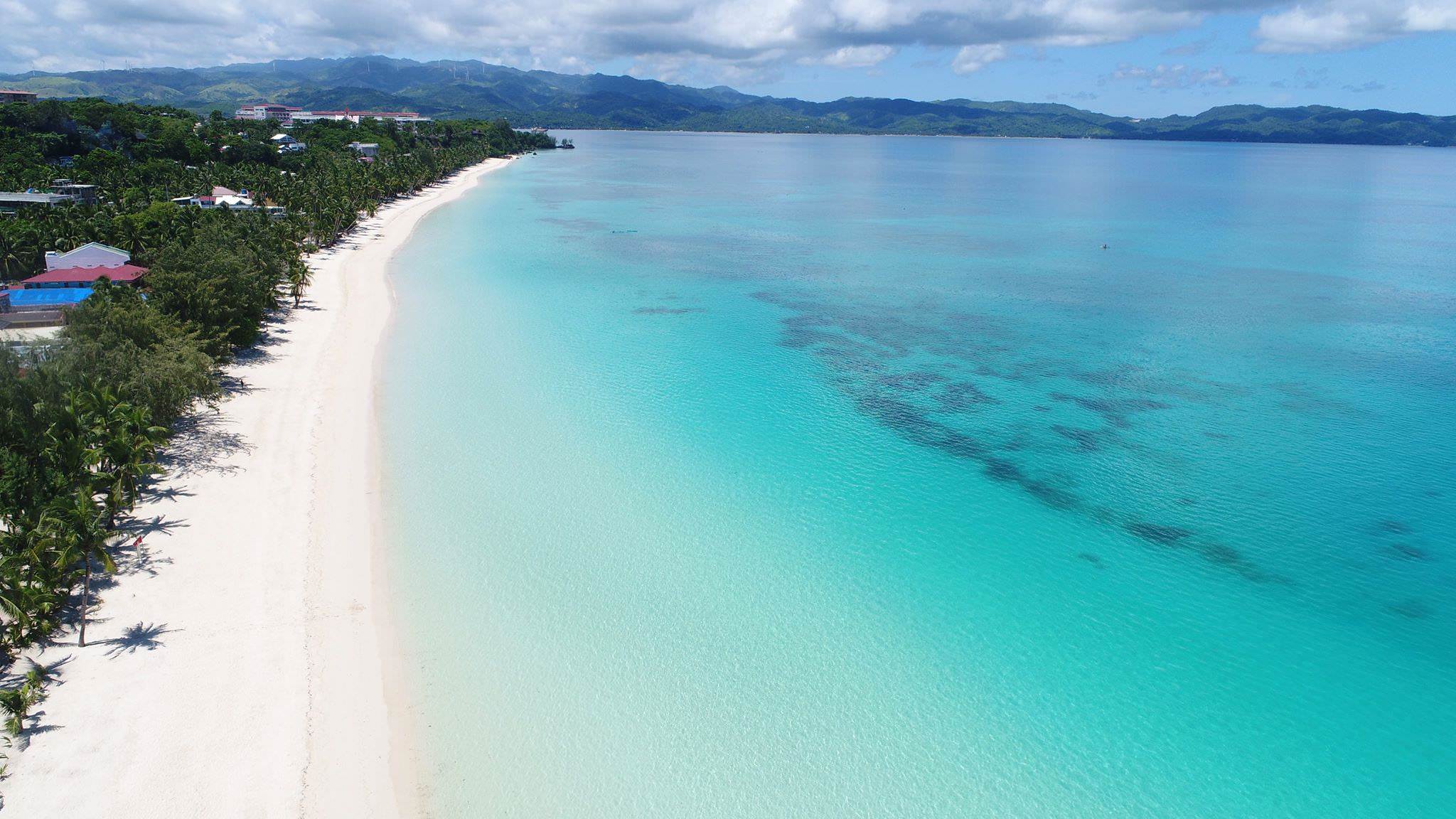 Aerial drone view of Boracay Island showing White Beach and the turquoise water